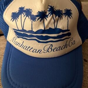 Blue and White Manhattan Beach Trucker Hat with Palm Tree Design